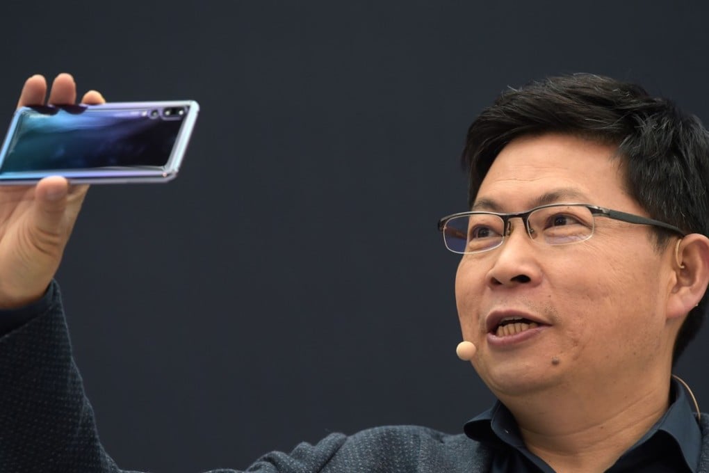Huawei CEO Richard Yu presents the new P20 smartphone in Paris on March 27. Photo: Agence France-Presse