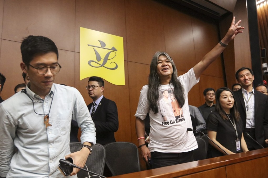 The four lawmakers (front row, left to right) Law, Leung, Lau and Yiu will not have to return their salaries. Photo: Felix Wong