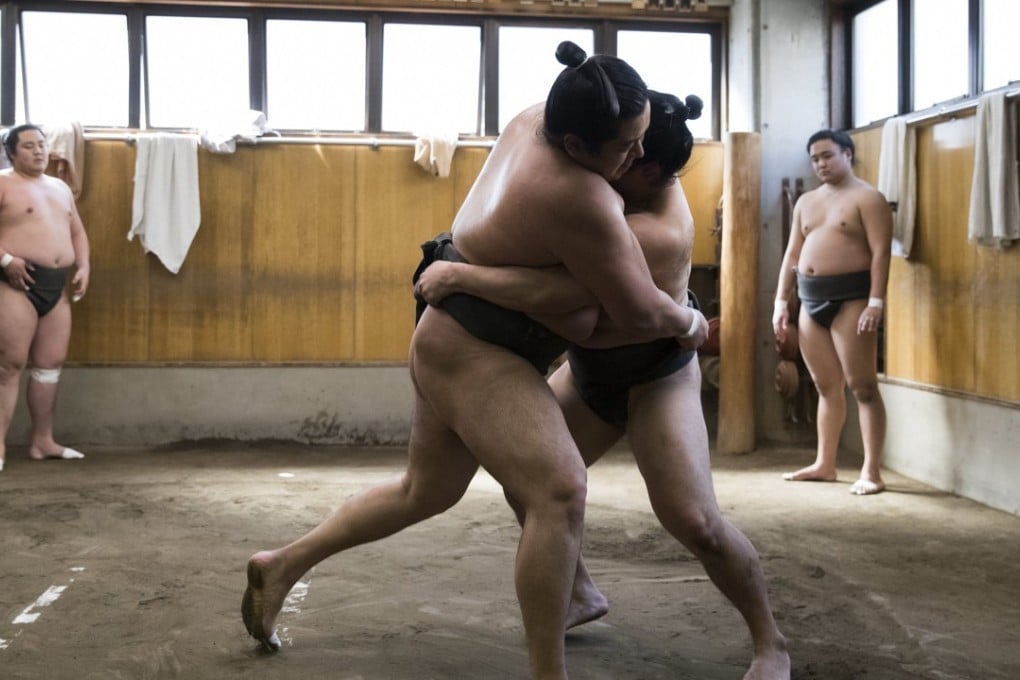 Sumo wrestlers during a training session in Tokyo. Photo: EPA