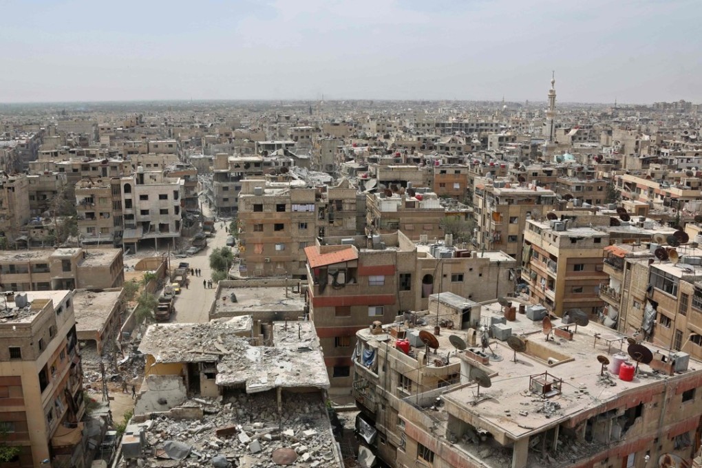 The Syrian town of Douma, on the outskirts of Damascus, is seen on Tuesday. A UN reconnaissance unit was attacked in the town that day. They had been there to give the all-clear for weapons inspectors investigating an alleged chemical attack on the town’s inhabitants. Photo: AFP