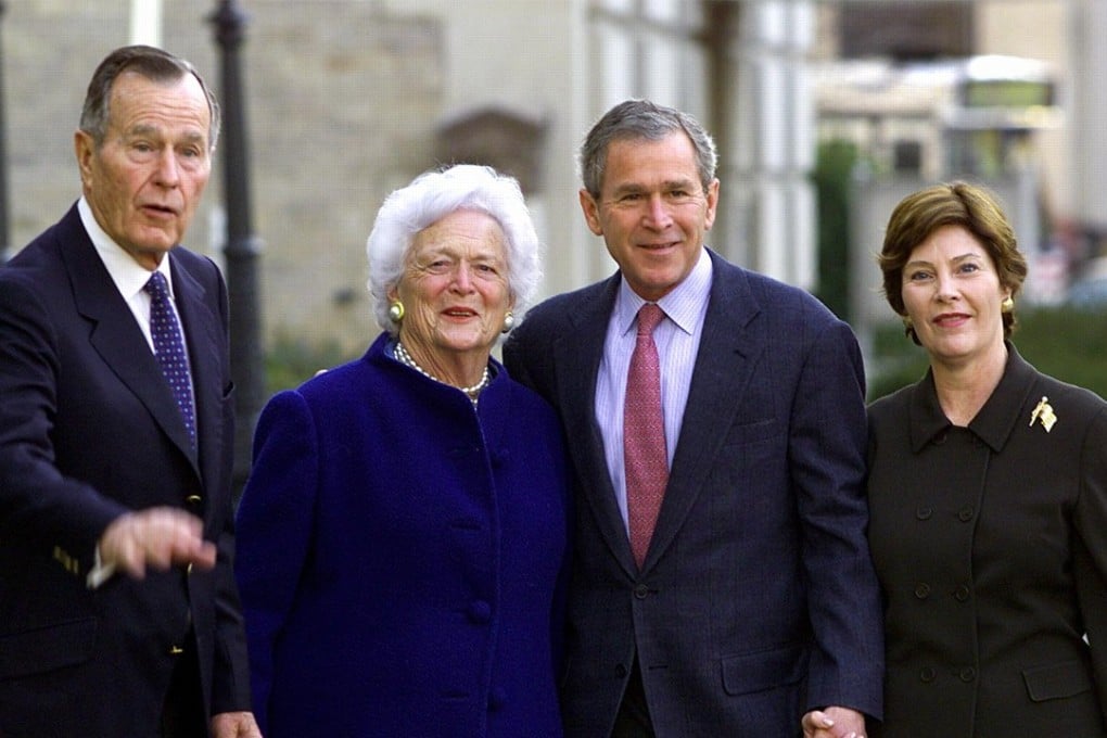 Barbara Bush (second from left) is seen with husband George H.W. Bush (left), son US President George W. Bush and daughter-in-law Laura Bush outside St. John’s Episcopal Church after services on January 26, 2002. Photo: AFP
