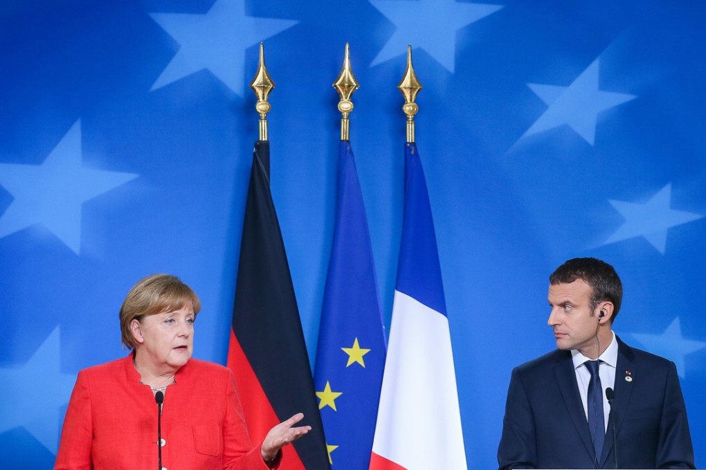 German Chancellor Angela Merkel (left) and French President Emmanuel Macron hold a joint press conference at the end of the European Council meeting in Brussels, Belgium, in June 2017. The failure of the German-led and the France-led blocs in the euro zone to agree on a reform agenda is a worrying sign. Photo: EPA