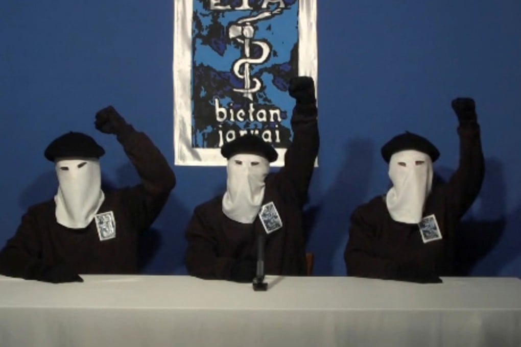 Three members of Basque separatist group ETA in 2011, calling for a definitive end to 50 years of armed struggle. Photo: Reuters
