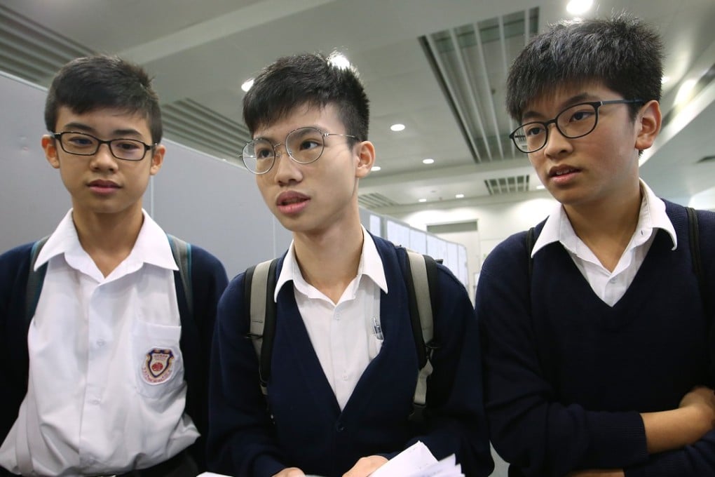 Junior secondary students poised to learn the ropes of business early in life, after making a winning bid in stall auctions for the Lunar New Year fair at Victoria Park, in November last year. Photo: David Wong