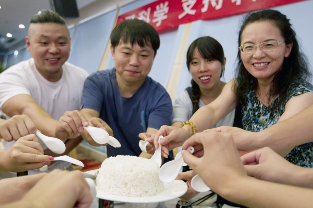 Participants at a GM rice tasting event, in Beijing in 2014. Photo: Simon Song