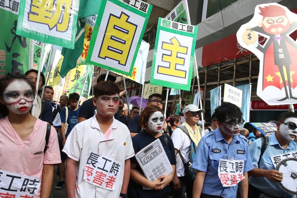 Participants in the annual July 1 march, from Victoria Park to the Hong Kong government headquarters in Admiralty, last year. Photo: David Wong