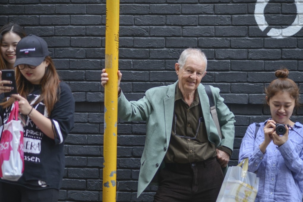 Photographer Magnus Bartlett in Hong Kong’s Central district. Picture: Antony Dickson