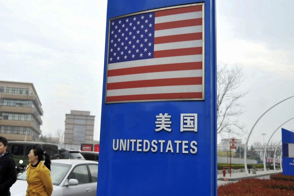 The US flag is shown on a signboard outside a supermarket selling imported groceries in Qingdao, Shandong province. America’s Tweeter-in-Chief Donald Trump is increasingly becoming a danger to himself, and making US democracy a laughing stock around the world. Photo: AP