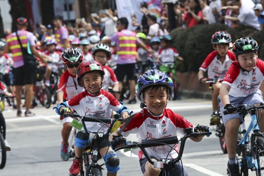 Young participants pedal away at the Hong Kong Cyclothon, in Tsim Sha Tsui, in October 2017. Photo: Jonathan Wong