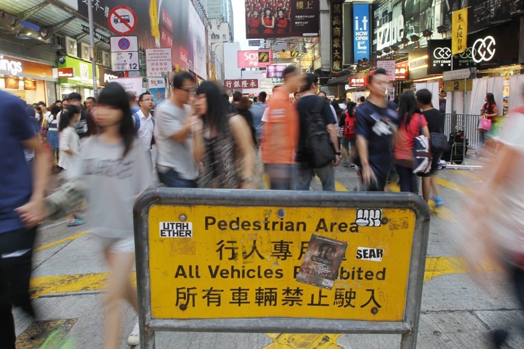 Sai Yeung Choi Street South in Mong Kok. Hong Kong’s Transport Department introduced restrictions on vehicle access on some Mong Kok streets in 2000 to ease overcrowding. But the pedestrian-only operating hours have been cut short over the years due to noise complaints. Photo: Sam Tsang