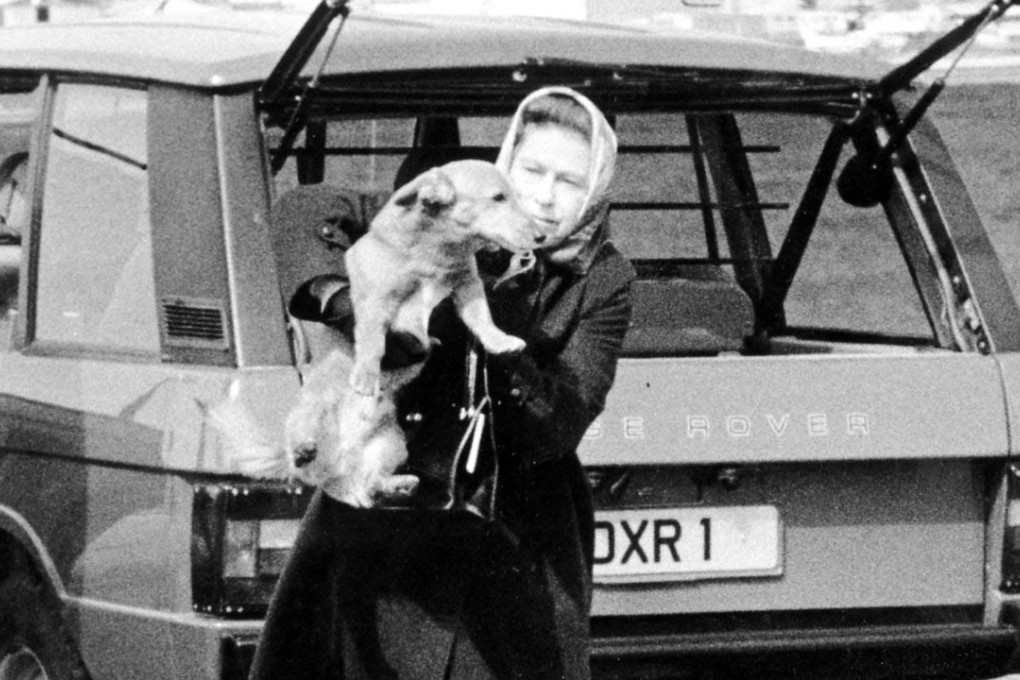 Queen Elizabeth is seen in an undated photo with one of her beloved corgis. Willow, the last of her corgis, died this week.