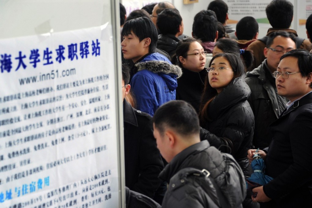 People look for work at a job fair in Shanghai. China’s unemployment rate was 5.1 per cent at the end of March, according to the new measure. Photo: ImagineChina