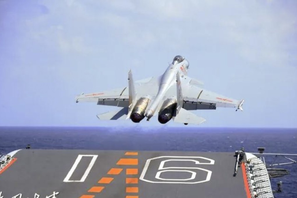 A J-15 fighter takes off from the Liaoning aircraft carrier during a drill on Friday. Photo: 81.cn