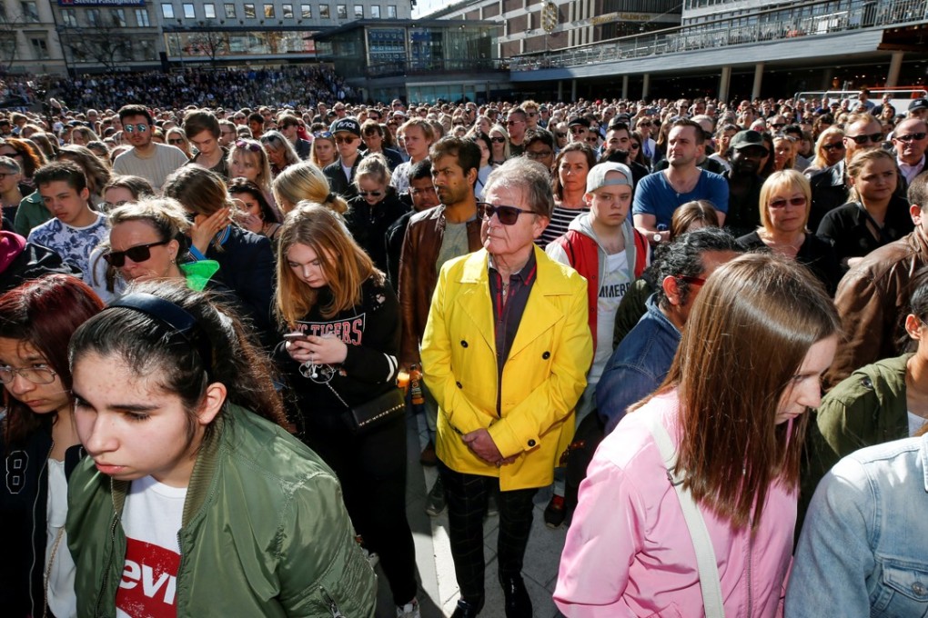 Fans of Avicii gather to honour him at Sergels torg in central Stockholm, Sweden on Saturday. Photo: TT News Agency via Reuters