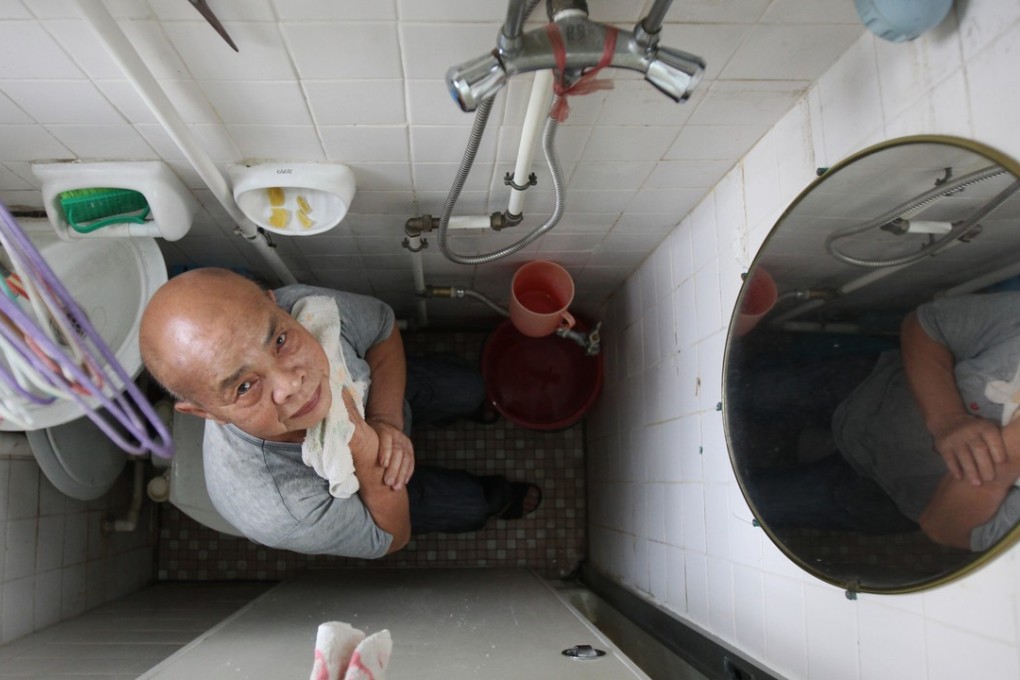 A resident of a Tuen Mun estate where the units have an internal floor area ranging from 90 to 300 sq ft. Photo: David Wong