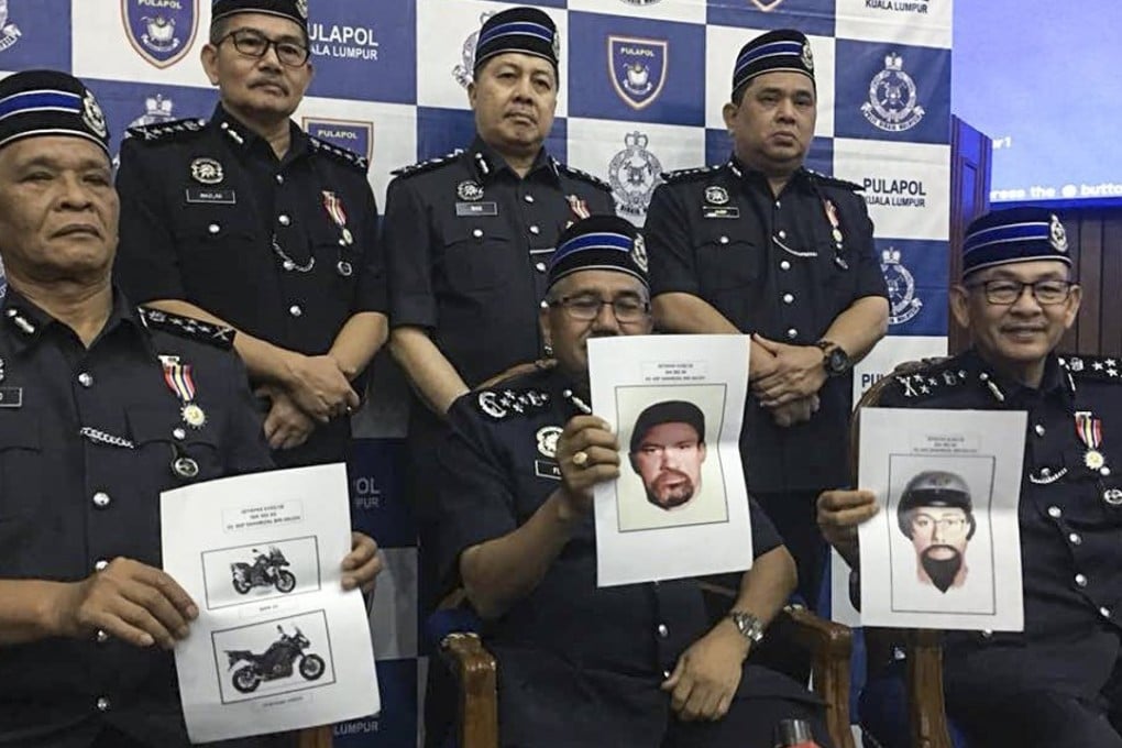 Inspector General of Royal Malaysian Police Mohamad Fuzi Harun (centre) and other police officials holding forensic facial reconstruction printouts of suspects involved in the killing of Palestinian scientist Fadi Mohammad al-Batsh. Photo: EPA
