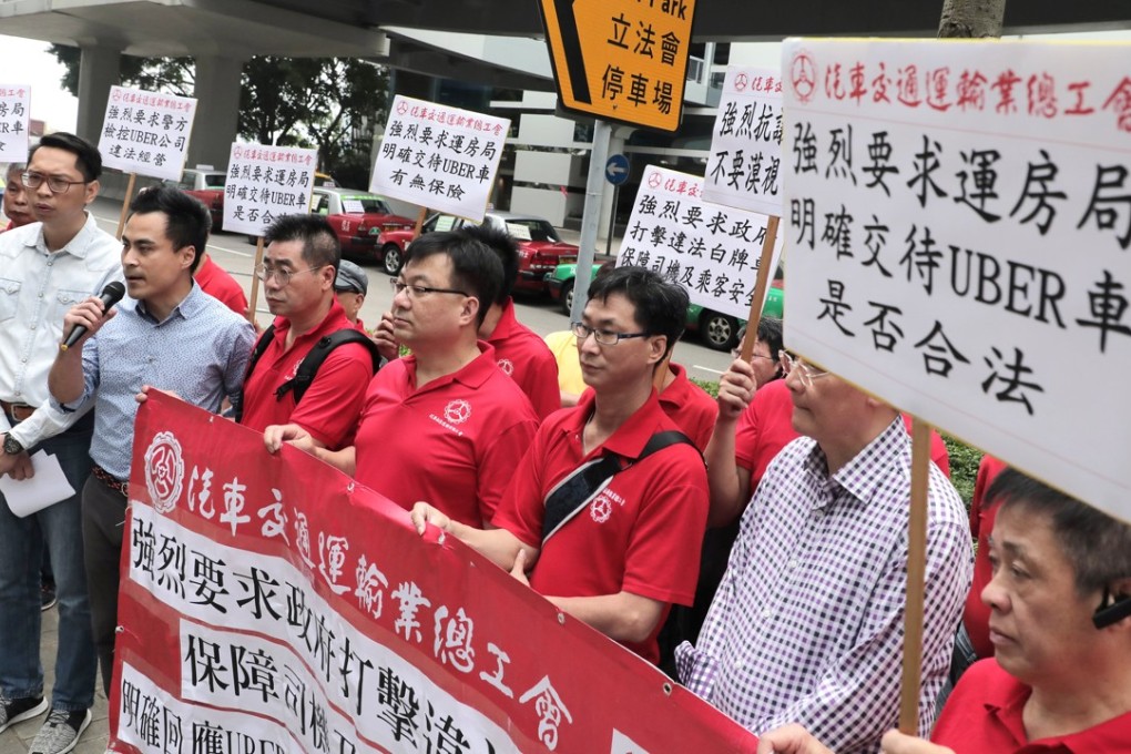 Taxi groups demand a crackdown on car-hire services such as Uber. Photo: SCMP Pictures