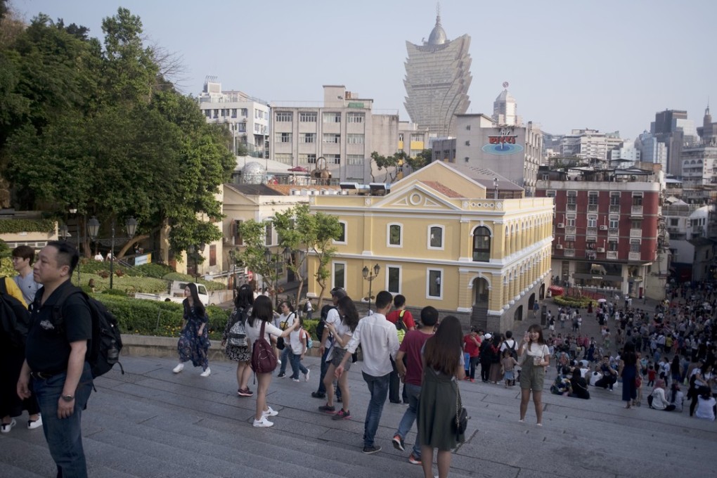 Visitor arrivals to Macau grew 5.4 per cent to reach 32.6 million last year, according to the city’s tourism bureau. Above, a view of the city from the Ruins of St Paul’s. Photo: Xiaomei Chen