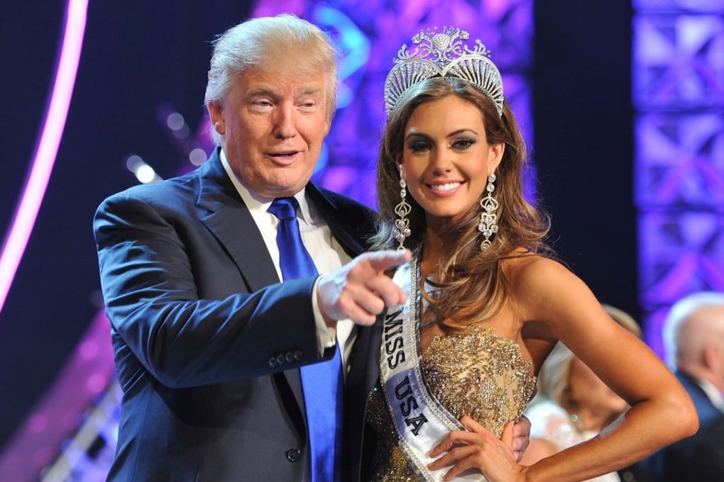 In this June 16, 2013 file photo, Donald Trump, left, and Miss Connecticut USA Erin Brady pose onstage after Brady won the 2013 Miss USA pageant in Las Vegas. Photo: AP
