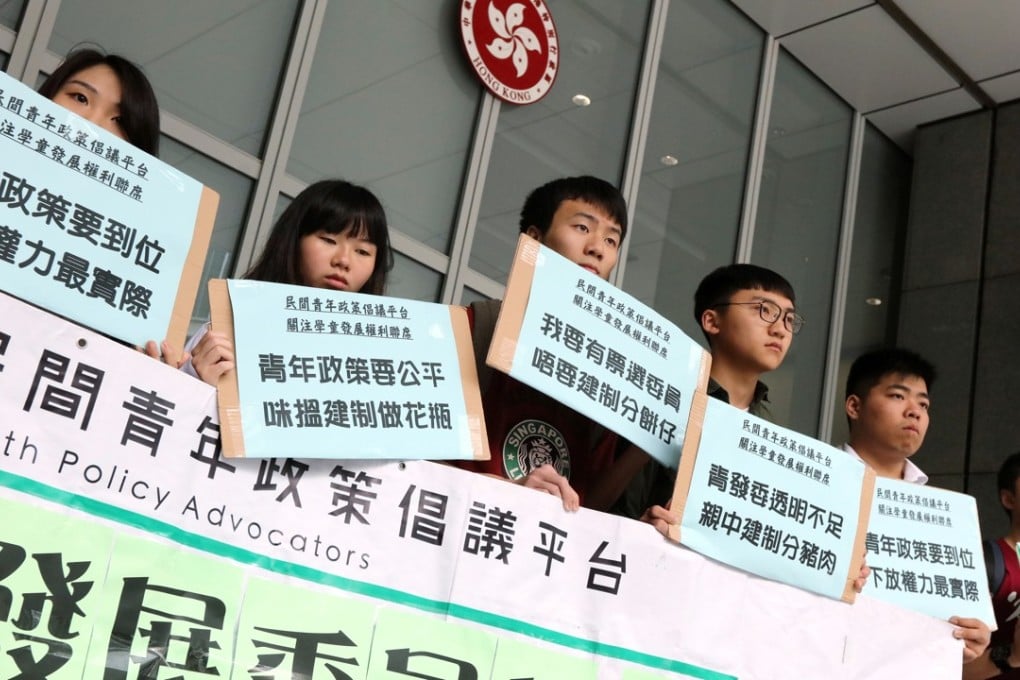 Young city residents from Youth Policy Advocators protested outside the governmnt headquarters. Photo: Felix Wong