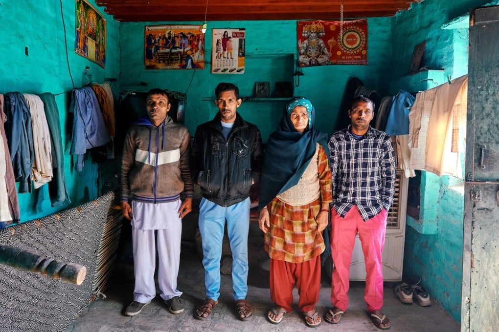 Om Pati is the mother of seven sons, including (from left) Sandeep, Sanjay and Suresh. Picture: Poras Chaudhary