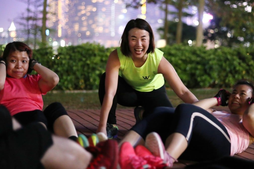 Jane Fang (centre) leads a boot camp at Tamar Park in Admiralty. Photo: Winson Wong