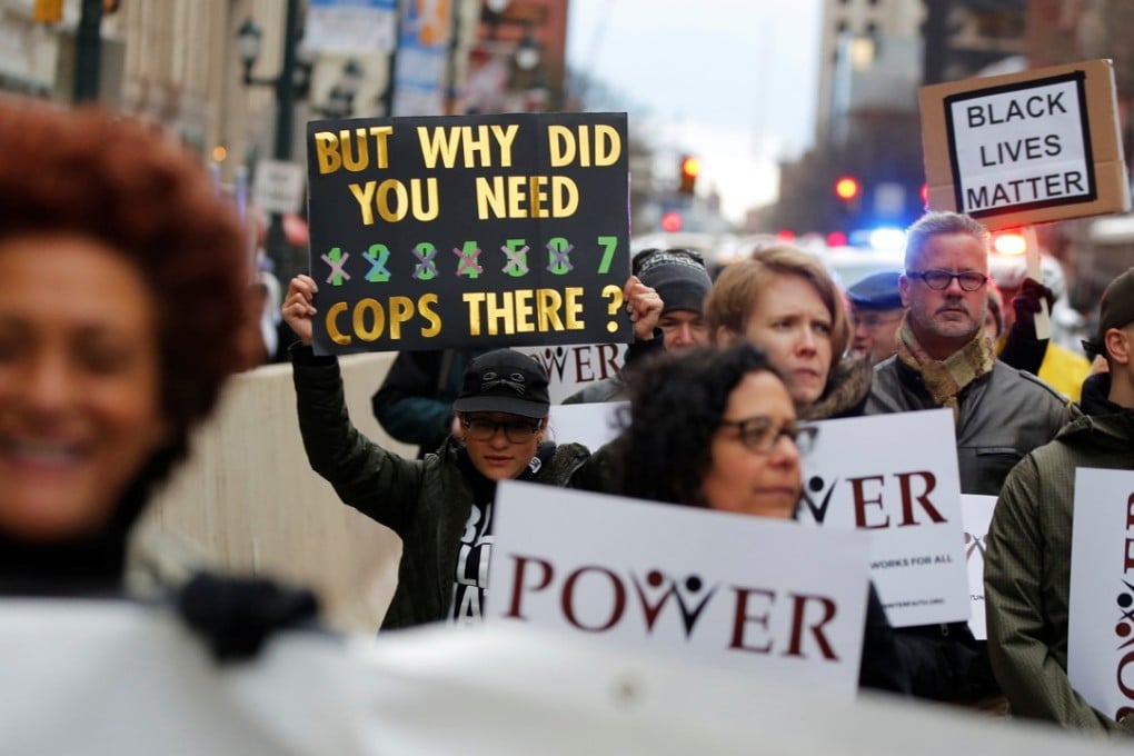 Protesters march down Market Street in Philadelphia on April 19, a week after two black men were arrested at a Starbucks coffee shop in Philadelphia, Pennsylvania. The company has been forced into damage-limitation mode after the arrests. Photo: Reuters