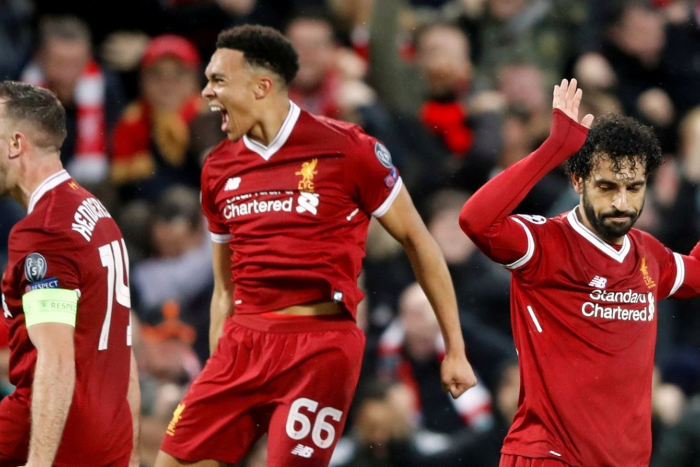 Mohamed Salah (right) refuses to celebrate after opening the scoring for Liverpool against his former club Roma. Photo: Reuters