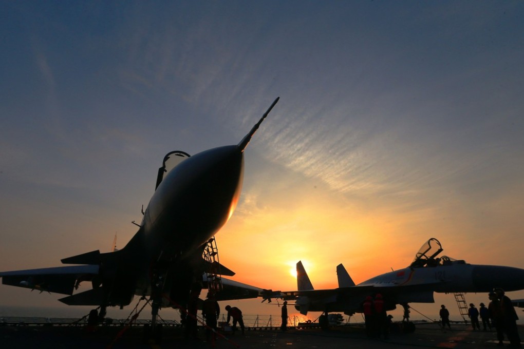 J-15 fighter jets on the deck of the Chinese aircraft carrier the Liaoning during a naval drill in the East China Sea this week. Photo: Agence France-Presse