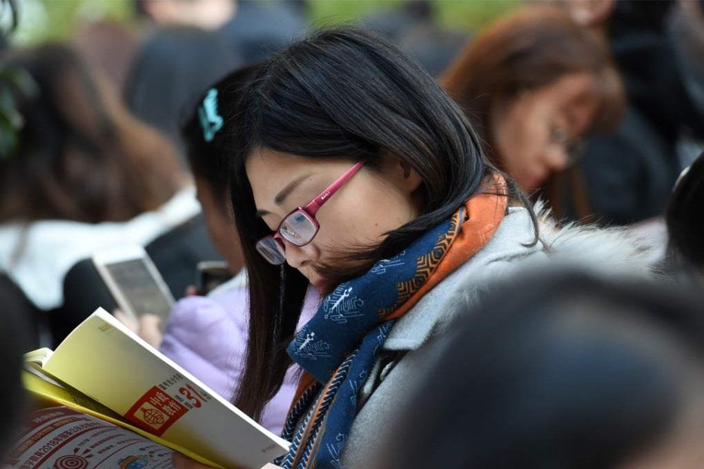 A woman prepares for the National Civil Servant Exam at Nanjing Forestry University in Jiangsu province in December 2017. A Human Rights Watch report found 19 per cent of civil service job postings explicitly stated a preference for men. Photo: Xinhua