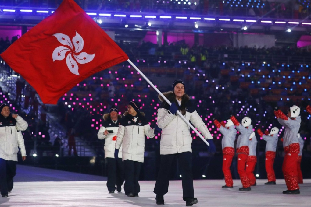 Arabella Ng carries the Hong Kong flag at the opening ceremony of the Pyeongchang Winter Olympics, where North and South Korea marched under a unified flag. Hong Kong’s unique position could make it one of the contenders for hosting the upcoming summit between US President Donald Trump and North Korean leader Kim Jong-un. Photo: Reuters