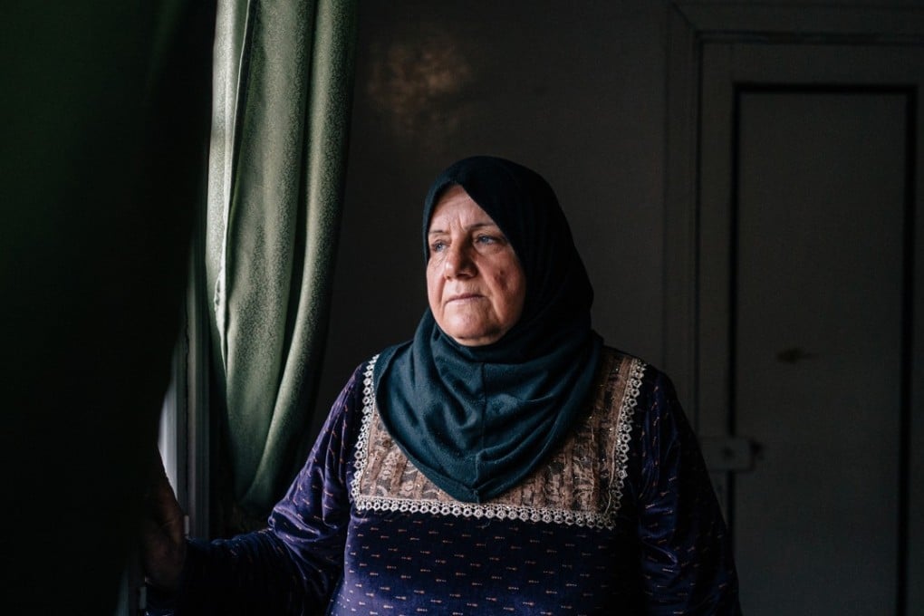 At her home in Raqqa, Samira al-Nasr, 66, says she was forced by Islamic State militants to deliver their wives' children according to their rules. Photo: Washington Post