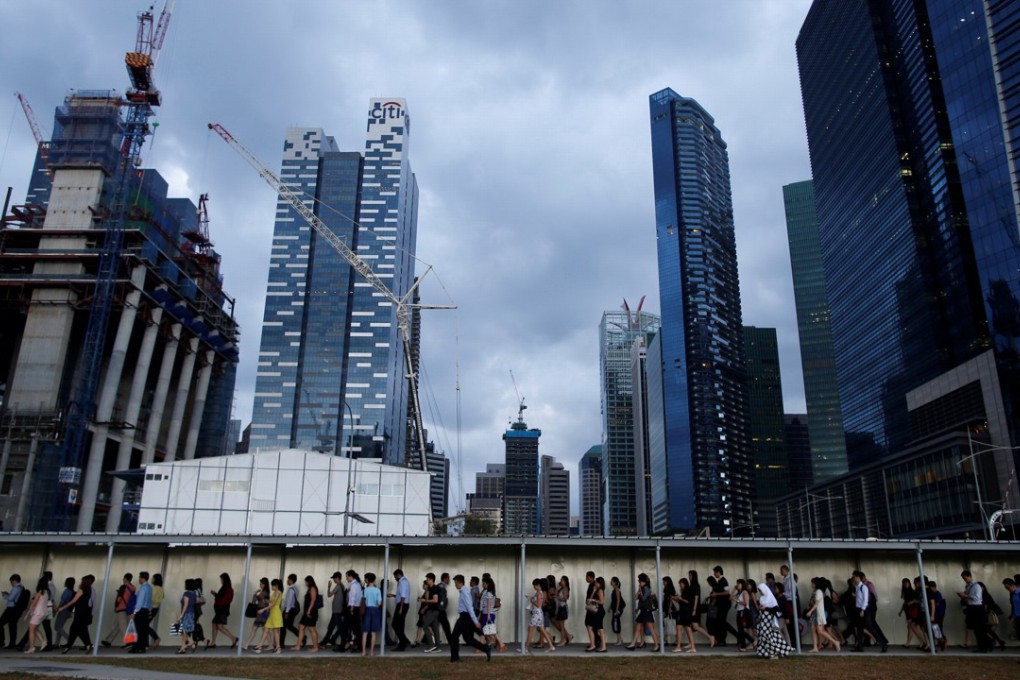 Workers and employers in Singapore need to change their mindset to adapt to the digital revolution. Photo: Reuters