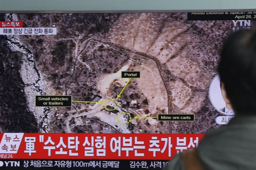A man in Seoul watches a TV news program reporting a North Korea nuclear test. Photo: AP