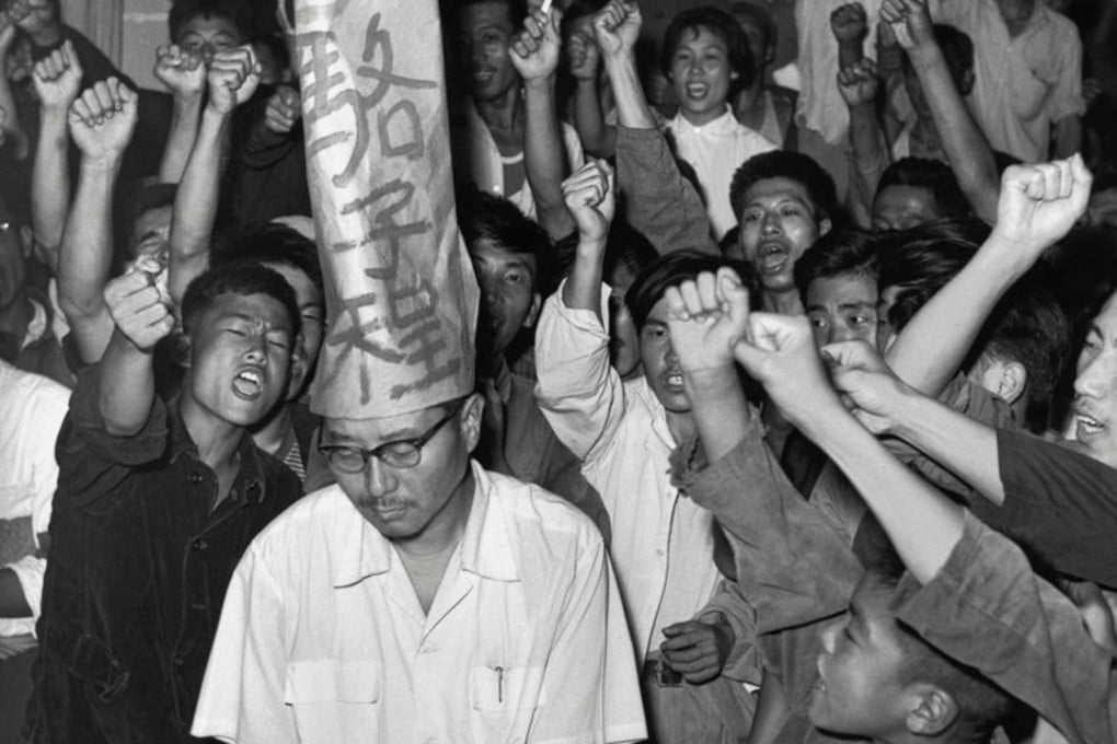 Heilongjiang Daily staff denounce a provincial party official in Harbin during the Cultural Revolution, on August 25, 1966.