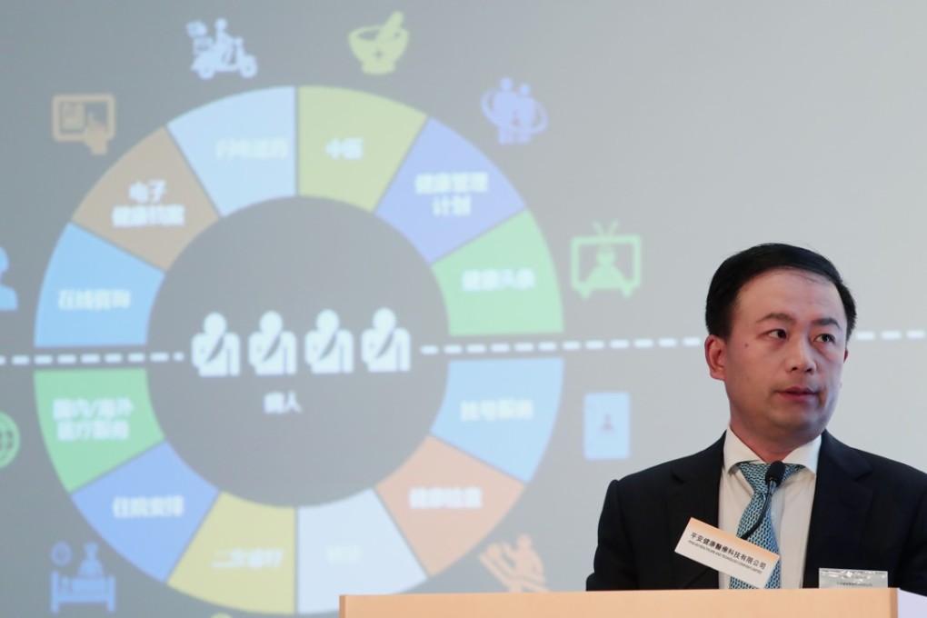 Wang Tao, chief executive of Ping An Healthcare and Technology, announces the company’s IPO during a press conference on April 22. Photo: Jonathan Wong
