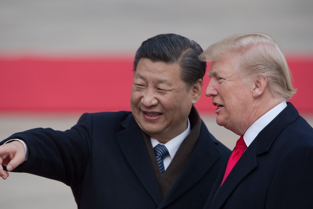 China's President Xi Jinping and US President Donald Trump attend a welcome ceremony at the Great Hall of the People in Beijing on November 8, 2017. Photo: AFP