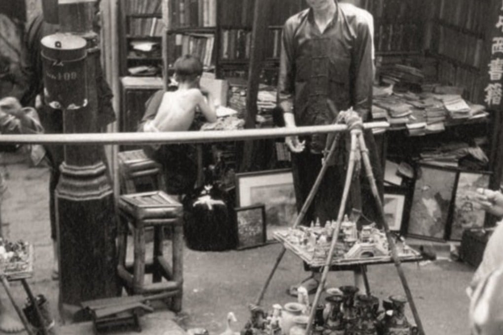 Spot the telling detail in this image of a Hong Kong storefront from the 1930s. Photo: Gwulo.com