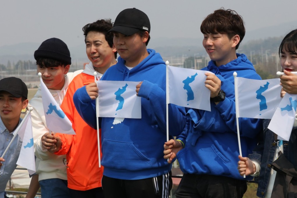 Supporters of the inter-Korean summit with the unification flag. Photo: Felix Wong