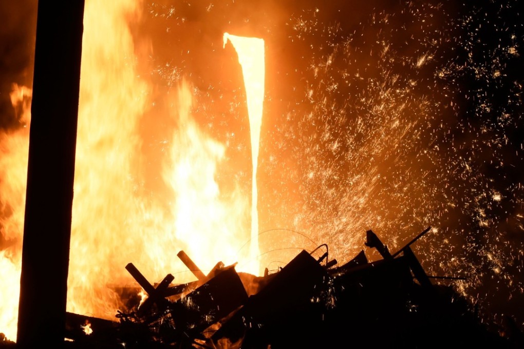 Molten steel at a factory in Zouping, Shandong province, China. China has said it is ready to pay “any cost” in a trade war with the United States. Photo: AFP