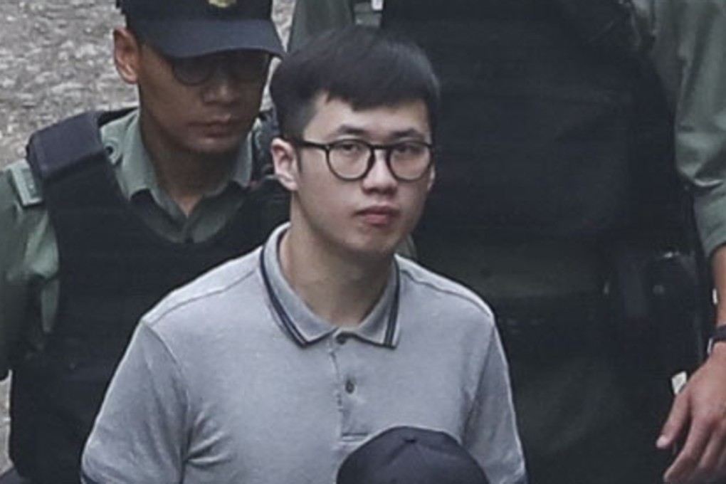 Keith Lau (centre) is escorted to court from the Lai Chi Kok Detention Centre. Photo: Edward Wong