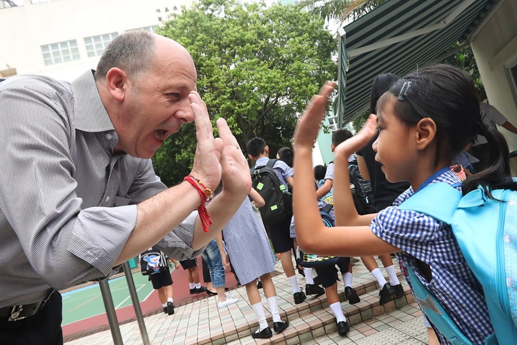 First day of school can be both exciting and challenging for parents and children. Photo: Edward Wong