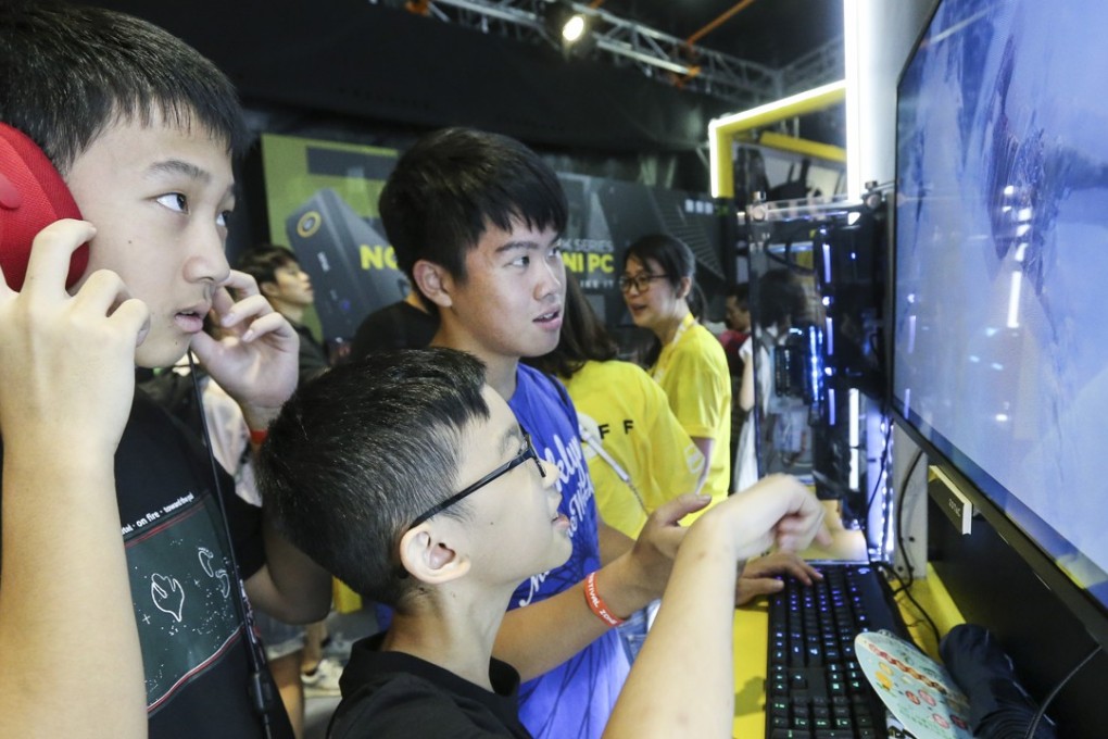 Children try out e-sports and virtual reality games and products at the Hong Kong E-Sports & Music Festival, at the Hong Kong Coliseum in Hung Hom, in August 2017. Photo: Dickson Lee