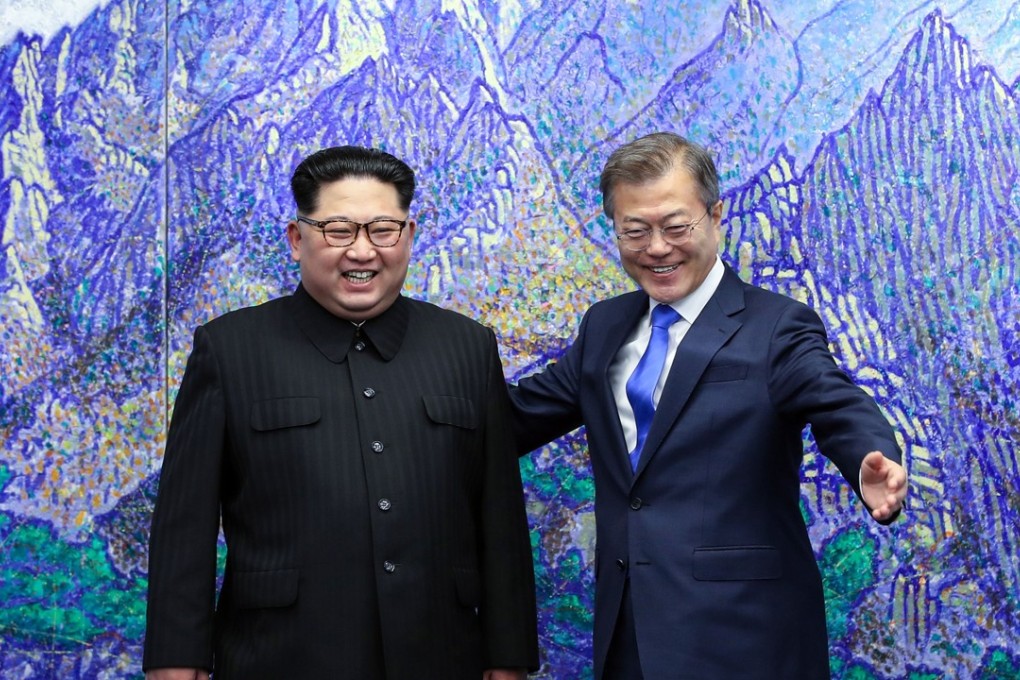 North Korean leader Kim Jong-un and South Korean President Moon Jae-in meet for talks in the Peace House building on the southern side of the truce village of Panmunjom on Friday. Photo: AFP