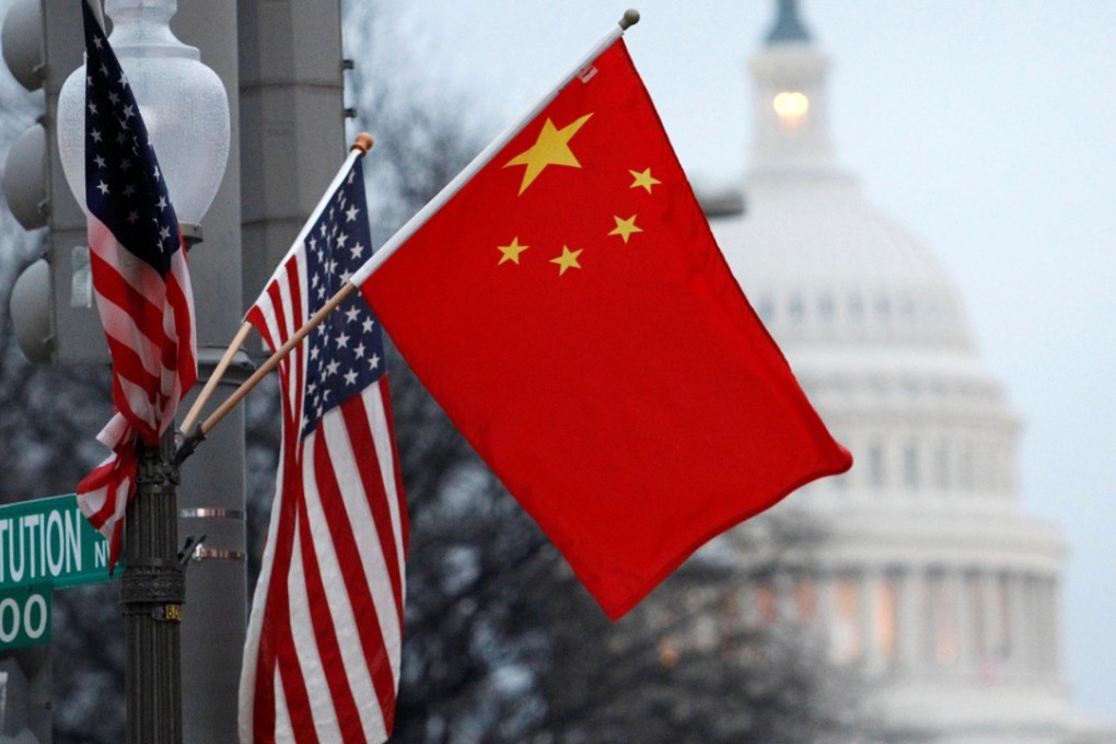 The Chinese and American flags fly on a lamp post along Pennsylvania Avenue near the US Capitol during then president Hu Jintao's state visit in 2011. The world is disoriented because the old order is changing, and all we know is that what is replacing it is going to be very different. Photo: Reuters