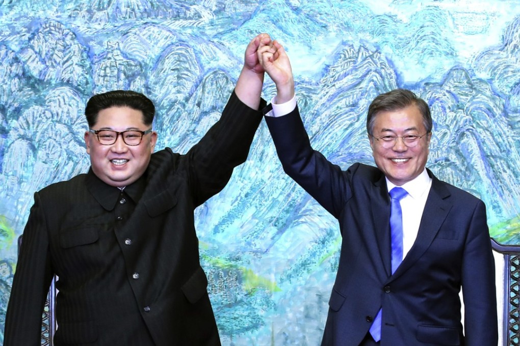 North Korean leader Kim Jong-un, left, and South Korean President Moon Jae-in signed a joint statement at the border village of Panmunjom in the demilitarised zone. Photo: AP