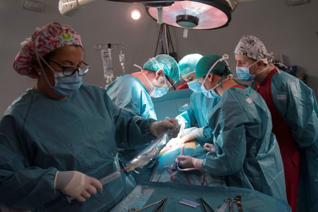 Surgeons perform a renal transplant. Photo: AFP