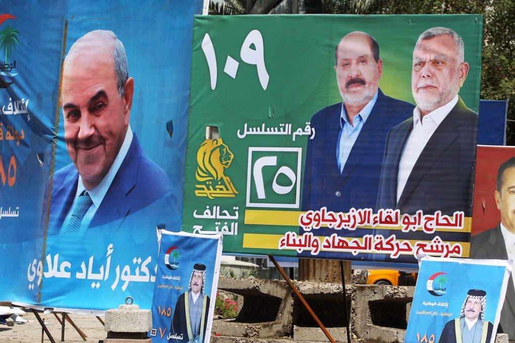 Electoral posters ahead of the parliamentary elections in Baghdad. Photo: AFP