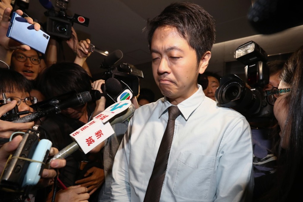 Lawmaker Ted Hui Chi-fung, from the Democratic Party, apologises at the Legislative Council Complex in Tamar on Thursday for grabbing the phone of a government official without her consent. Photo: Nora Tam