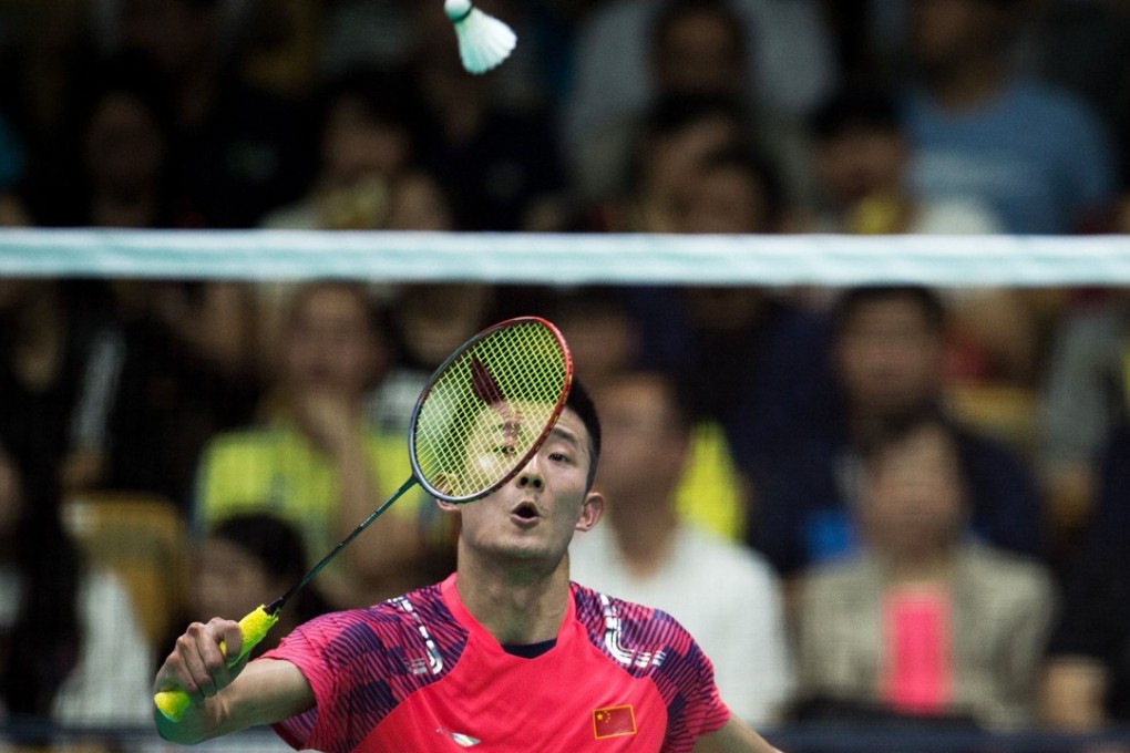 China’s Chen Long hits a shot to Hong Kong’s Angus Ng Ka-long. Photo: AFP
